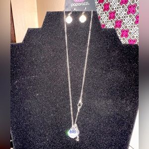 a dainty silver chain for a timeless twinkle below the collar.